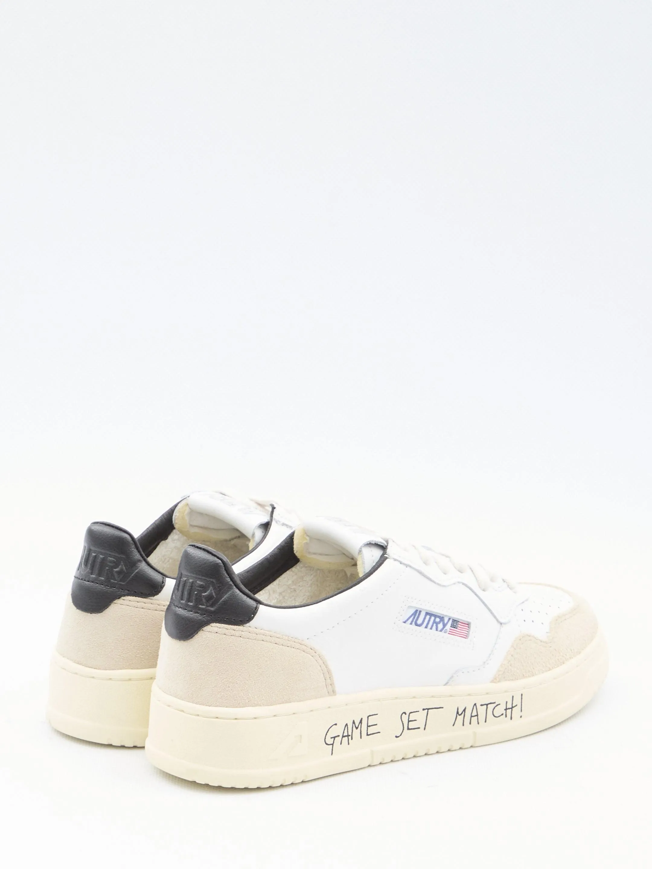 Autry Medalist Low Leather Sneakers in Ivory and Black